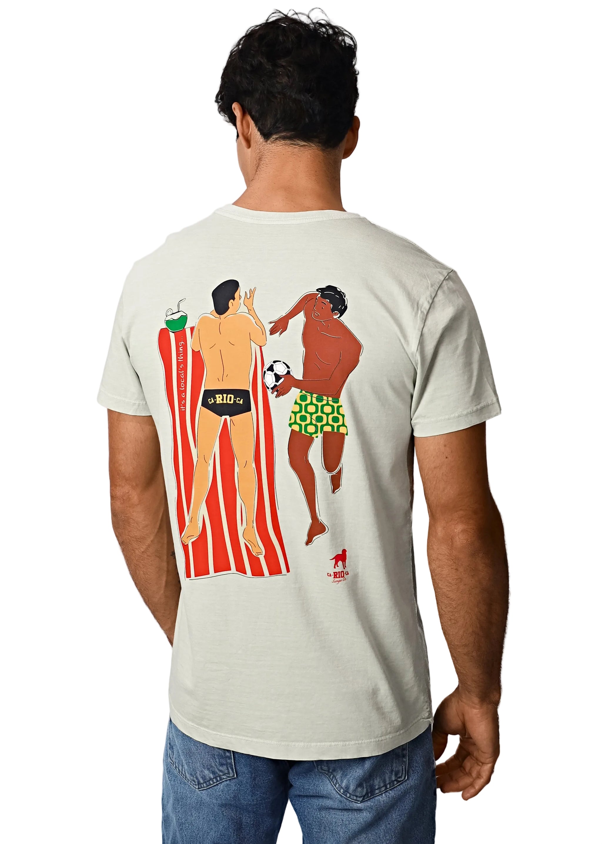 Man wearing a t-shirt with a colorful graphic on the back, standing against a white background