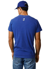Man wearing a blue t-shirt with a logo on the back against a white background
