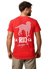 Man wearing a red t-shirt with a graphic design and text on the back, standing against a plain background.