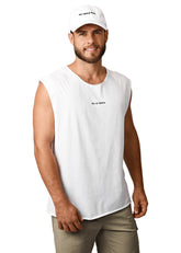 Man wearing a white sleeveless shirt and cap on a plain background