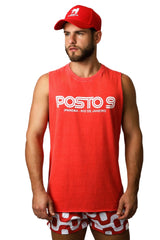 Man wearing a red sleeveless shirt with 'POSTO 9' branding and a matching cap on a white background.