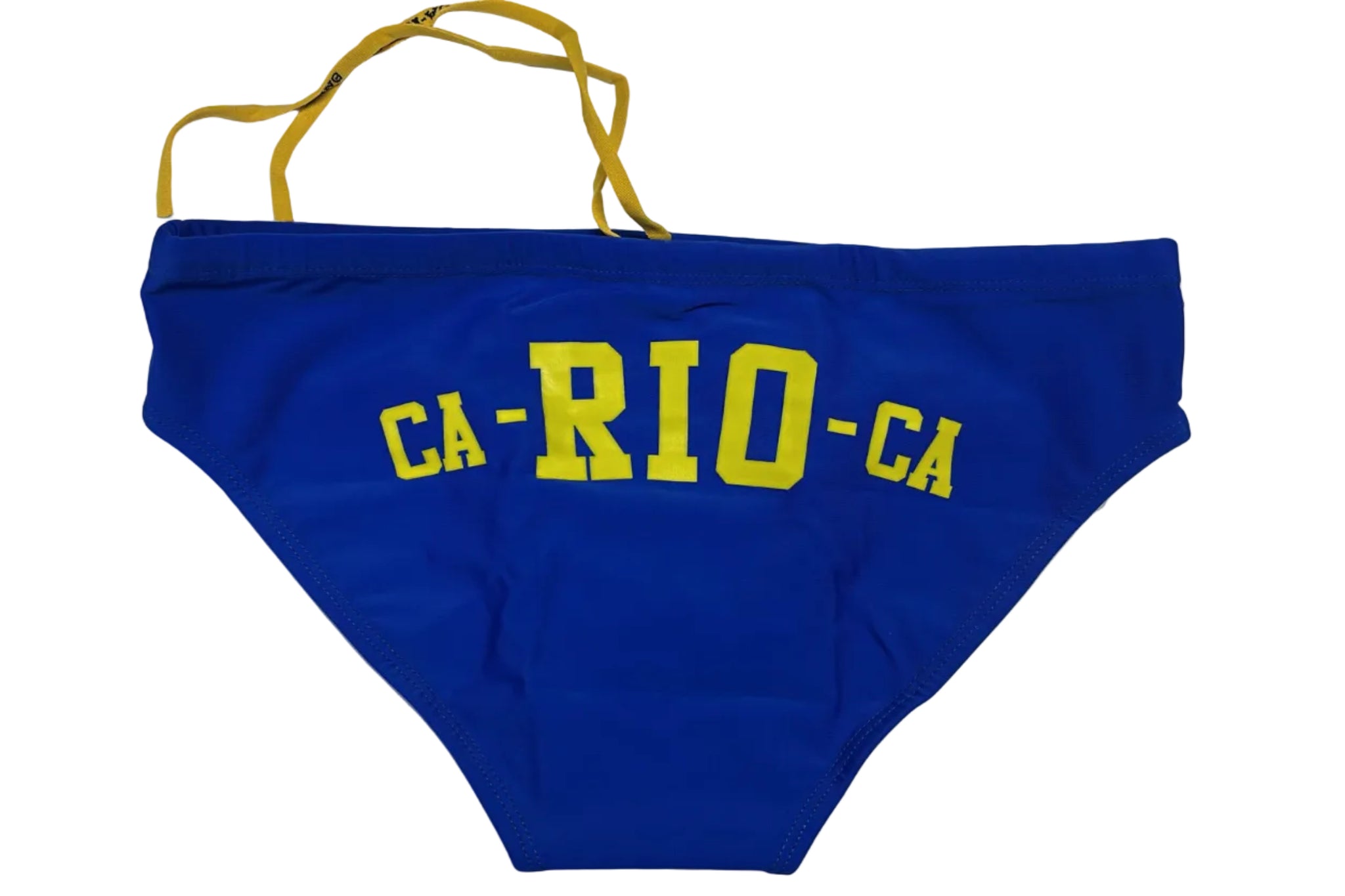 A royal blue swim cap with yellow 'CA-RIO-C.A' lettering and yellow ear loops, laid flat on a white surface.